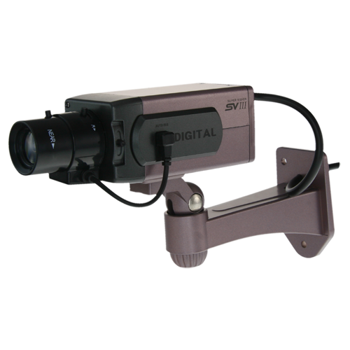 NIVIAN Simuleret (dummy) kamera - Full Body type med linse - Beslag inkluderet - Blinkende rød LED - Designet til indendørs brug - Strømforsyning 2 AA batterier